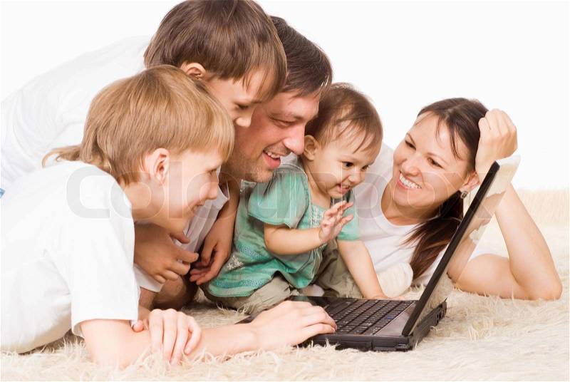 Family with computer, stock photo