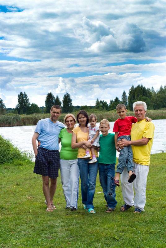 Family at lake, stock photo