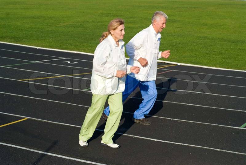 Old people running, stock photo