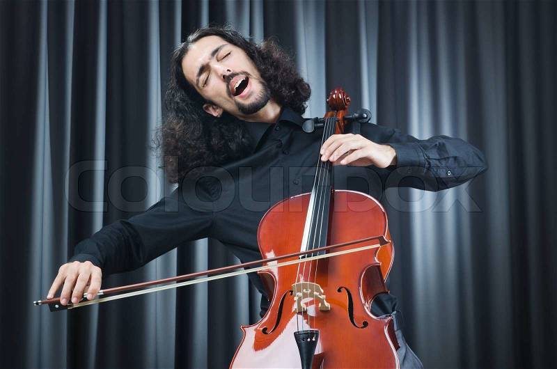 Man playing the cello, stock photo