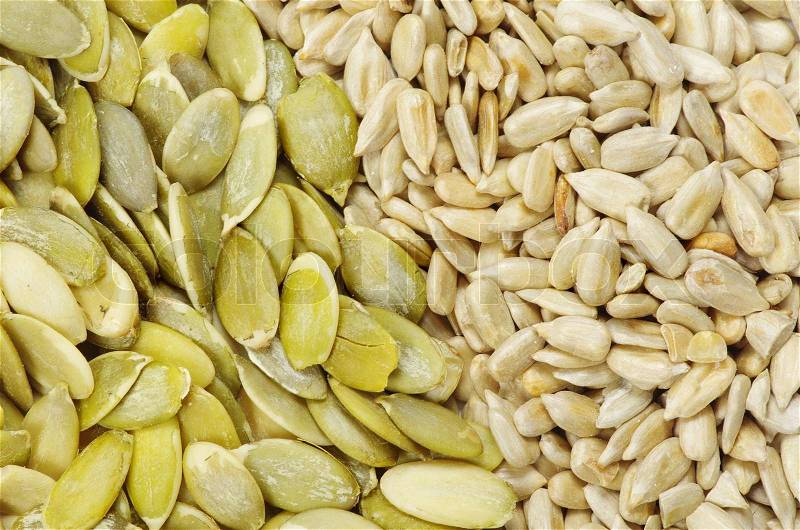 Close up image of sunflower and pumpkin seeds, stock photo