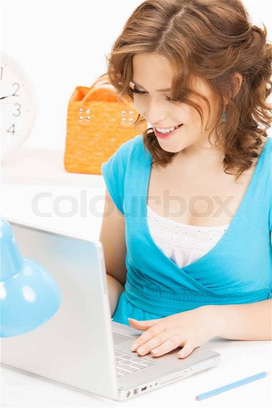 Happy woman with laptop computer, stock photo