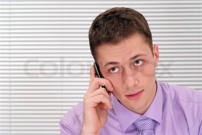 Guy with phone, stock photo