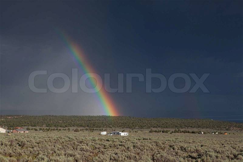 The rainbow before big storm in Arizona desert, stock photo