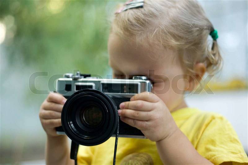 Little photographer, stock photo