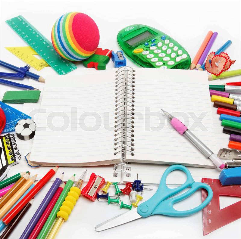 School supplies: notebook, pens, pencils on a white background, stock photo