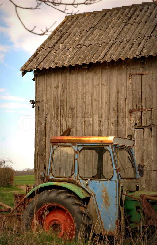 Vintage Farming Scene With Old Tractor, stock photo