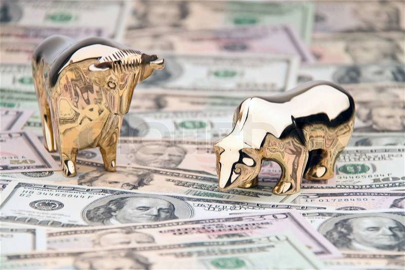 Dollar currency notes with bull and bear, stock photo