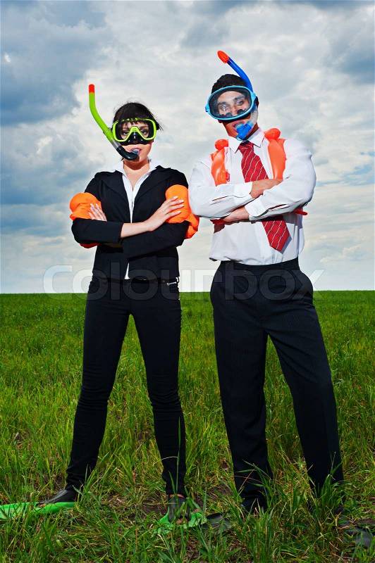Business people in scuba mask and flippers, stock photo