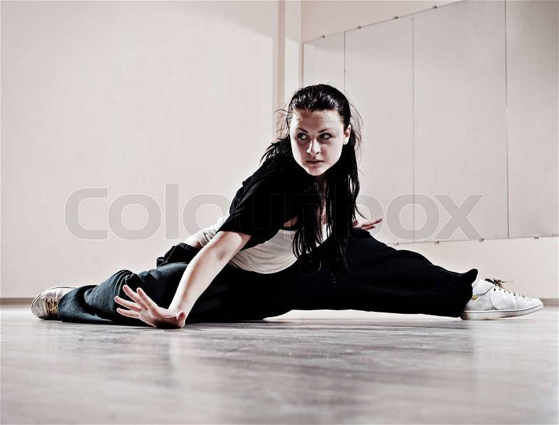 Hip-hop girl in dance motion, stock photo