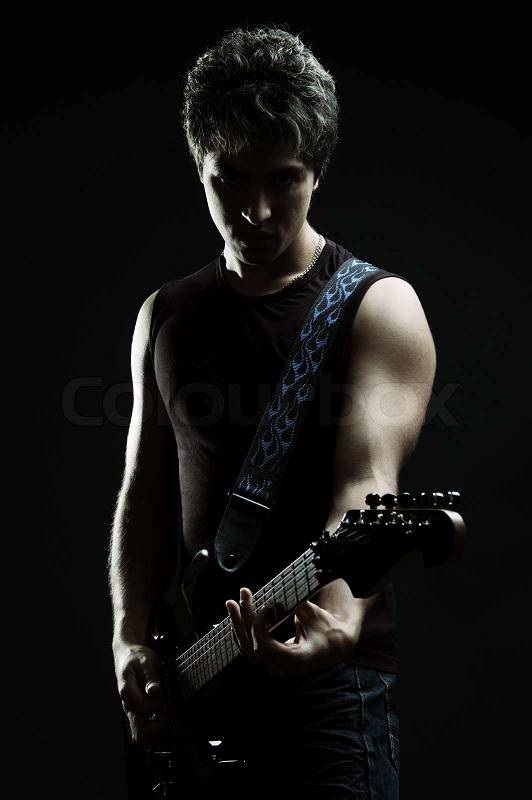 3998911-silhouette-of-man-with-guitar.jpg