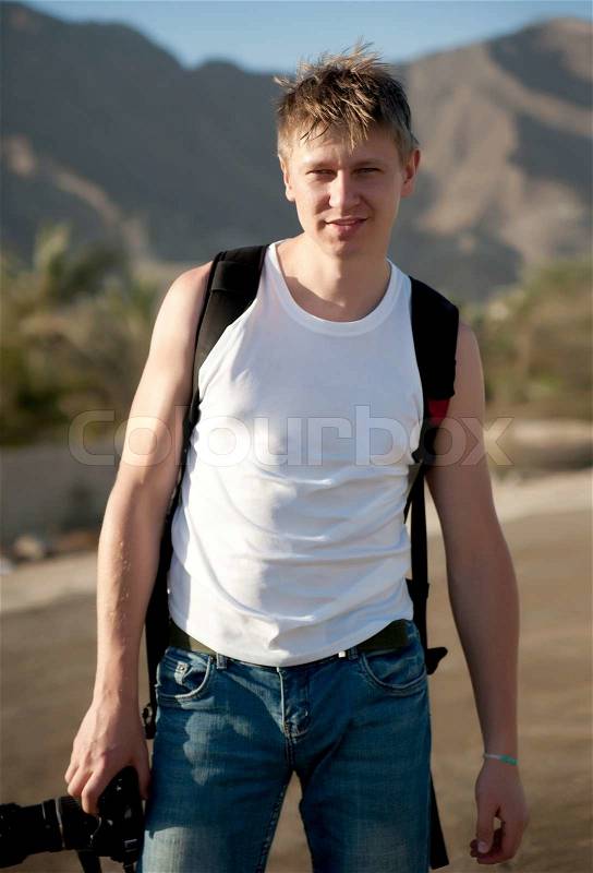 Professional man with camera, stock photo
