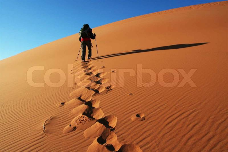 Hiking in desert, stock photo