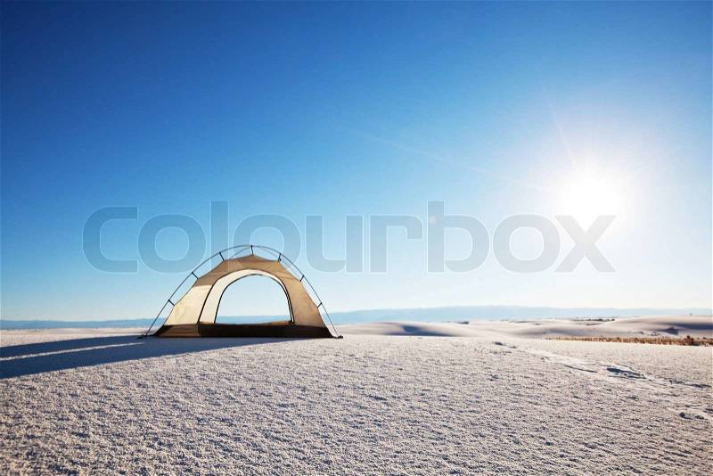 Tent in desert, stock photo