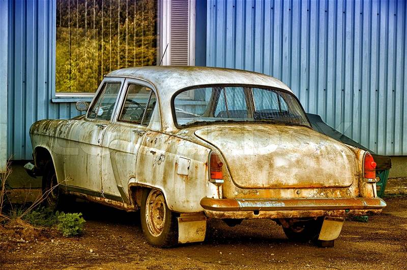 Old Soviet car in the parking lot, stock photo
