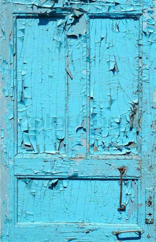 Cracked old painted blue door, stock photo