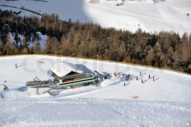 View down ski slope on chairlift station, stock photo