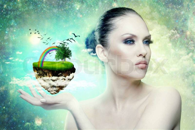 World of Magic Female portrait with abstract world in hand, stock photo