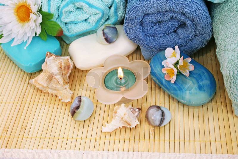 Towels, soaps, flowers, candles, stock photo
