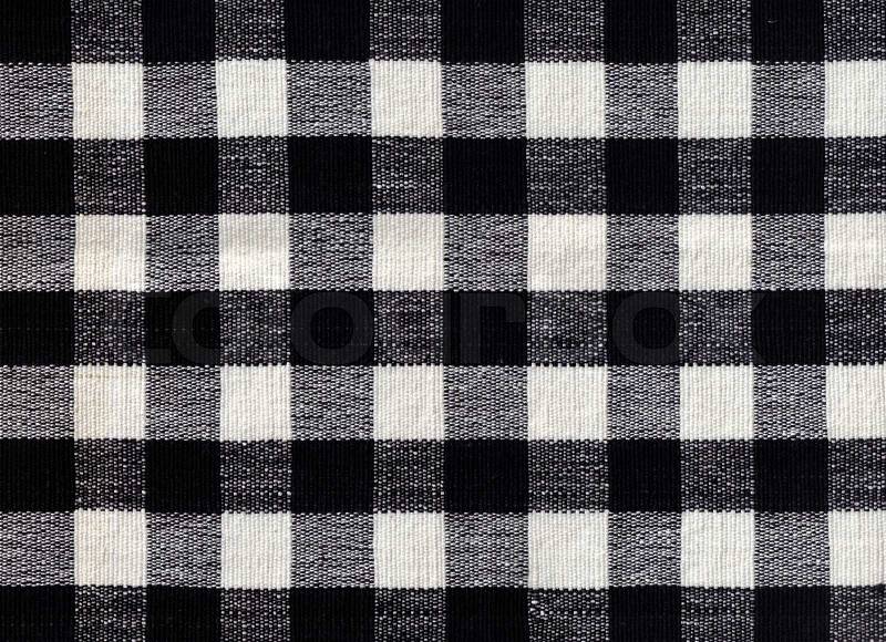 Black and white checked fabric background, stock photo