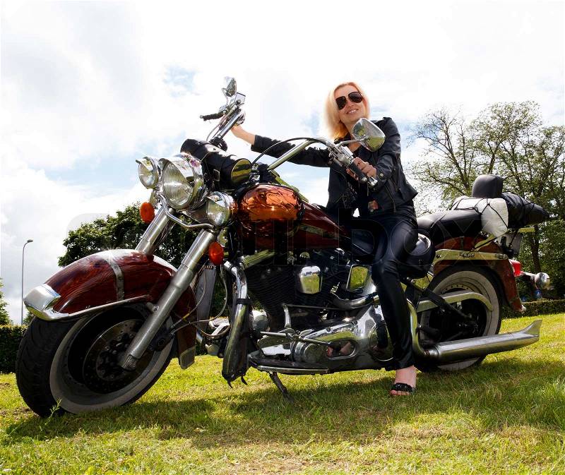 Woman on motorcycle, stock photo