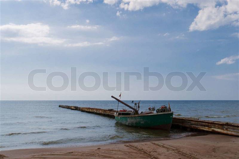 Lonely fishing boat, stock photo