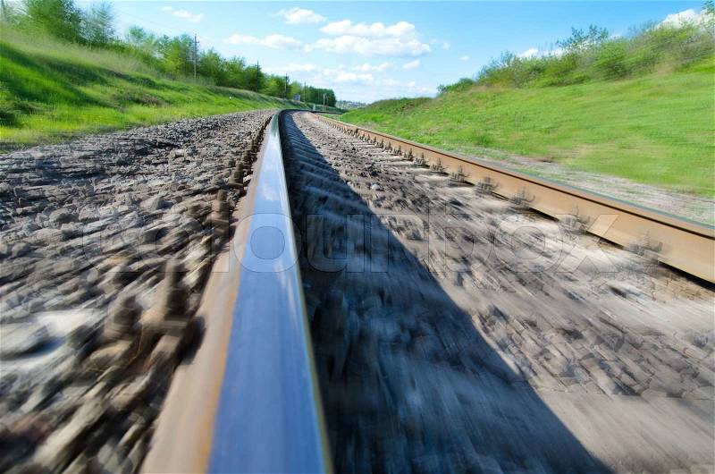 Railroad to horizon in motion, stock photo