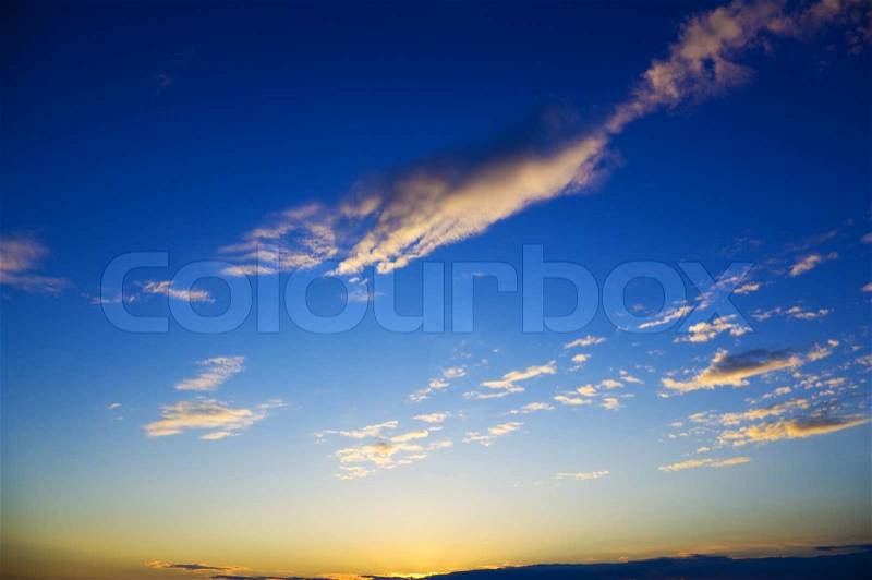 Cloudy sky in the sunset, stock photo