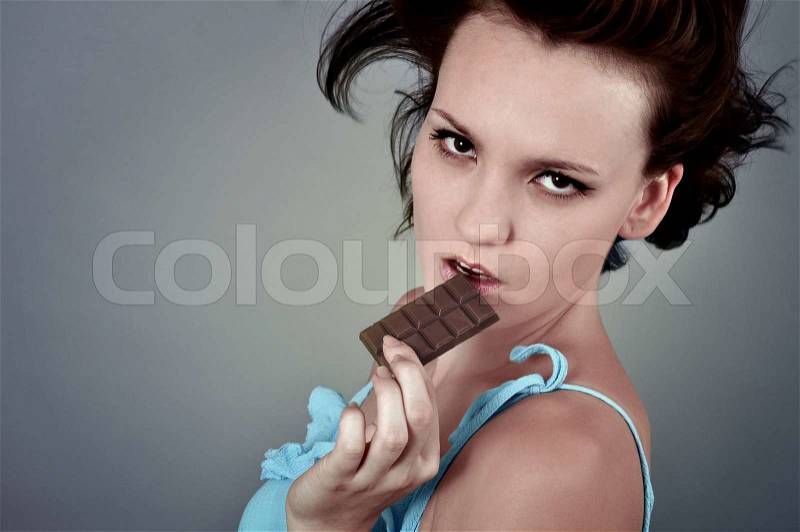 Woman and chocolate, stock photo