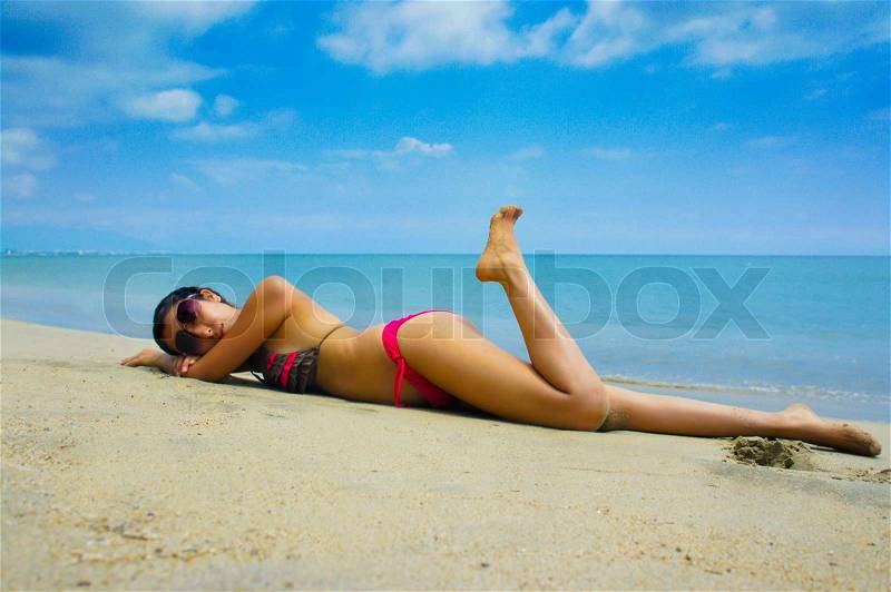 Woman Sun Tanning, stock photo