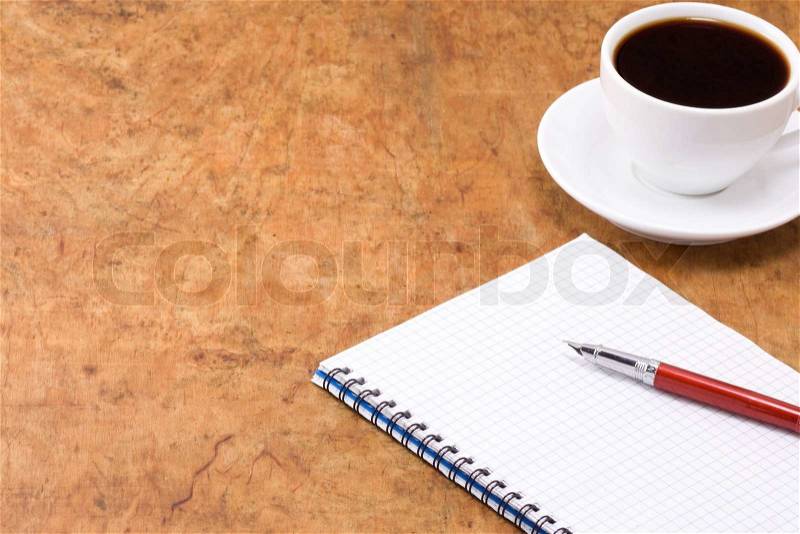 Coffee and ink pen pad, stock photo