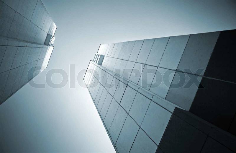 Abstract architecture monochrome background with two tall concrete walls, stock photo