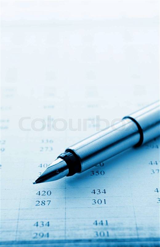 Ink pen and documents with the records for business, stock photo