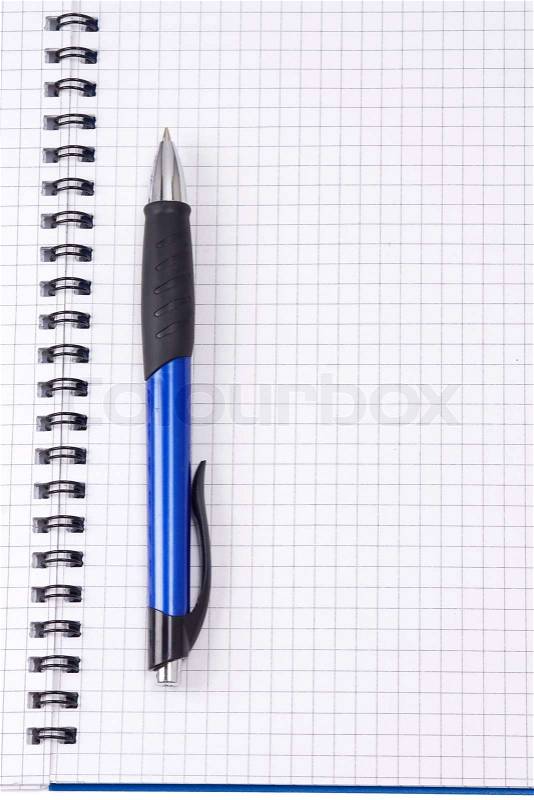 Pen on binder pad, stock photo