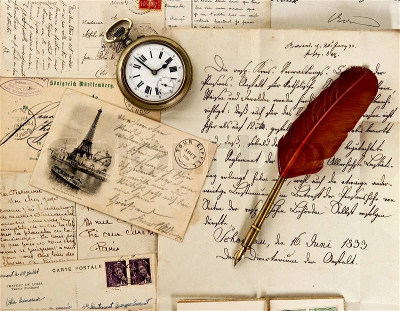Old letter and post cards with feather quill, stock photo