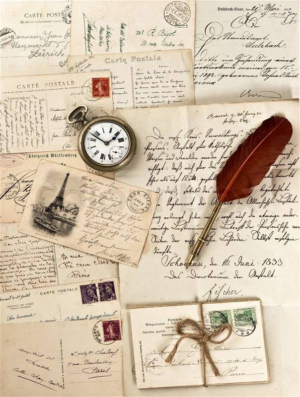 Letters and post cards with vintage clock, stock photo