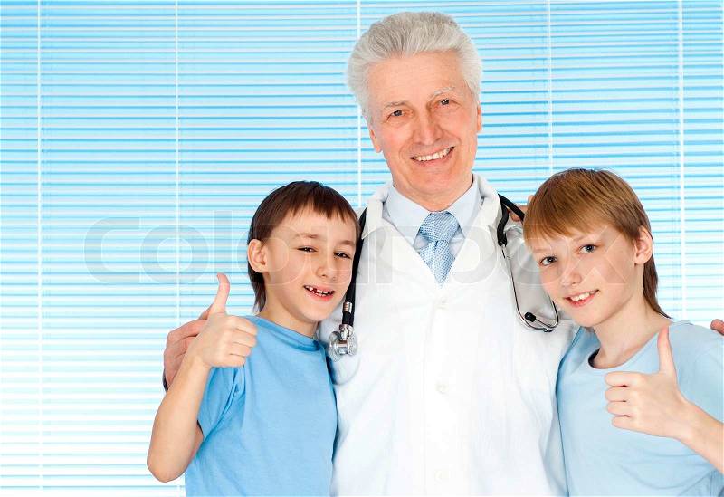 Caucasian elderly doctor with a patient, stock photo