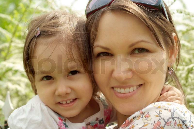Mom and her kid went for a walk, stock photo