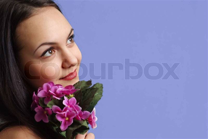 Luck Caucasian young woman with flowers, stock photo