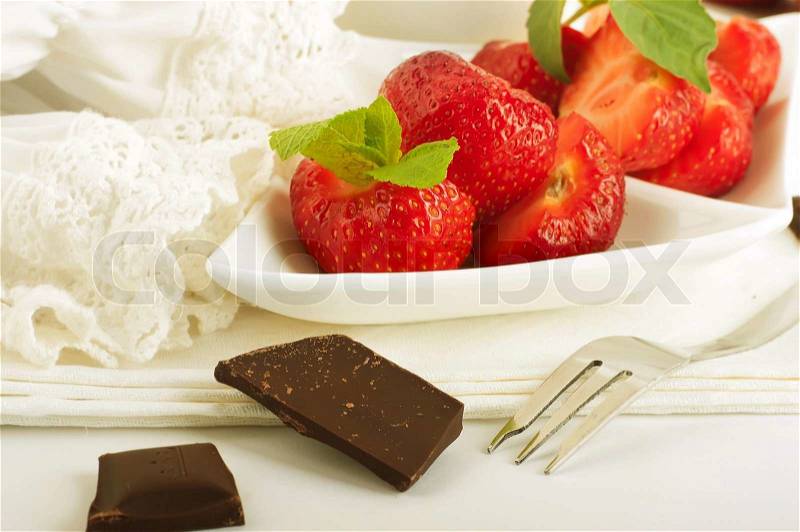 Strawberry with a mint and jug of milk, chocolate, stock photo