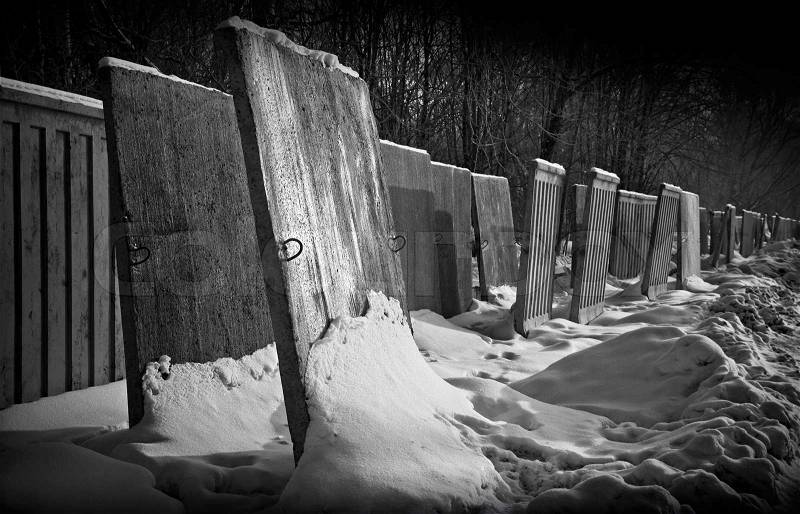 Wall street metaphor Black white photo of a unfair border made of concrete blocks, stock photo