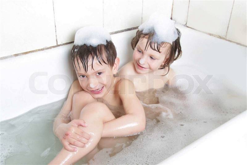 Two children having bath, stock photo