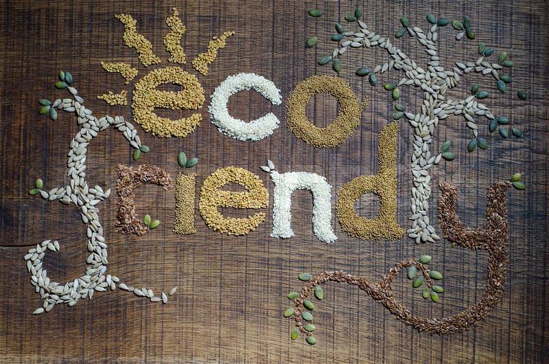 The phrase \'Eco Friendly\', written and decorated in seeds, stock photo