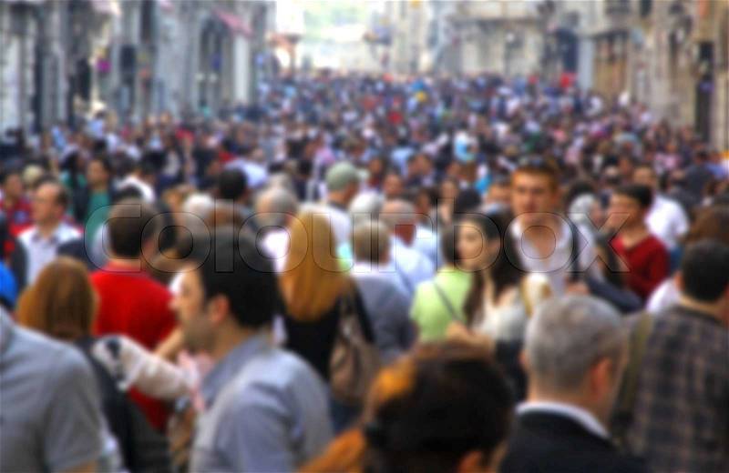 Blurred crowd of unrecognizable people at the Istiklal street in Istanbul, Turkey, stock photo