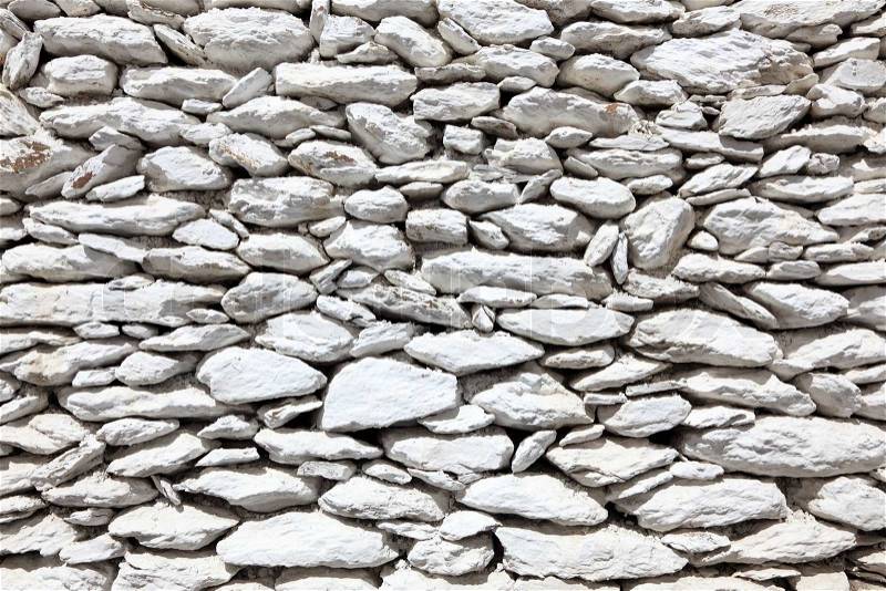 White painted stone wall, stock photo