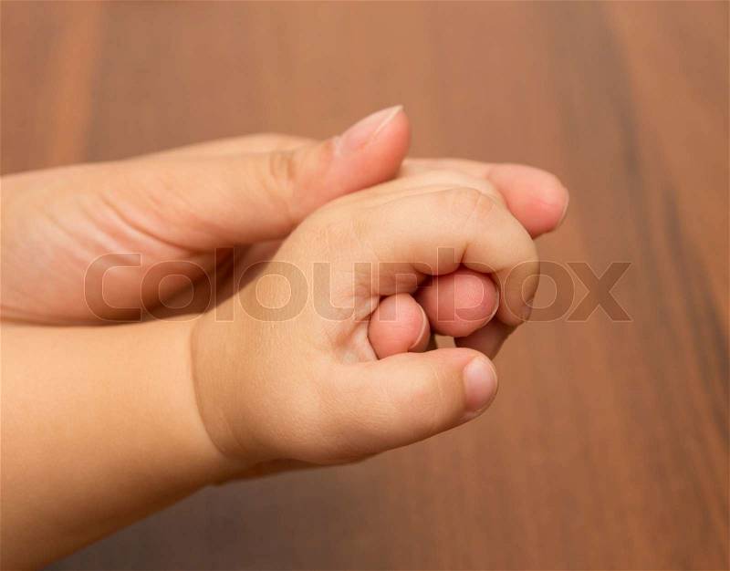 Hands mother and son, stock photo