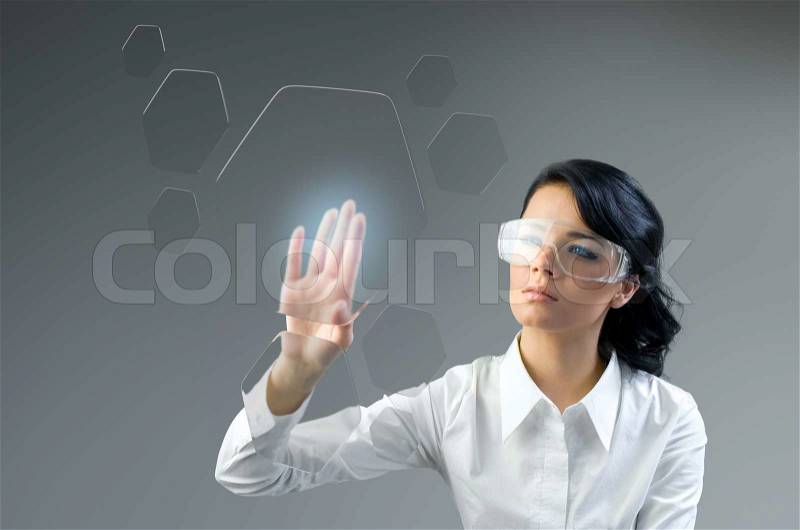 Push button transparent touch interface. Put logo, text or product. Brunette pressing copyspace sensor hexagon key. Future collection series, stock photo