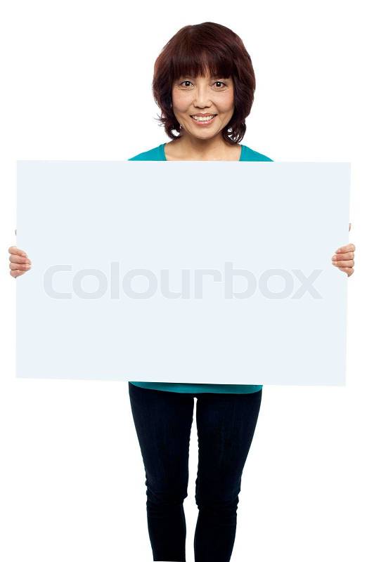 Woman holding billboard, your ad here, stock photo