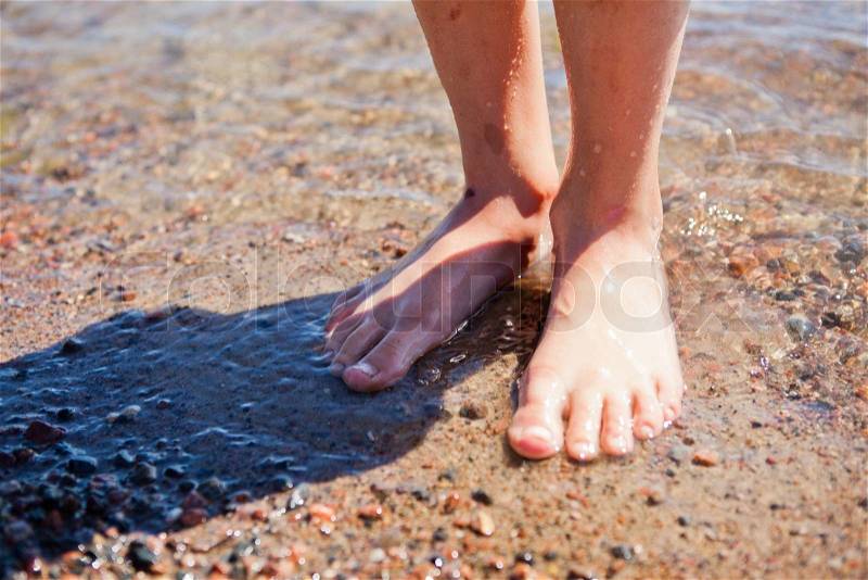 Feet in water, stock photo