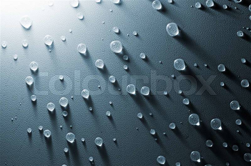 Water drops on the embossed surface of tension ceiling, stock photo